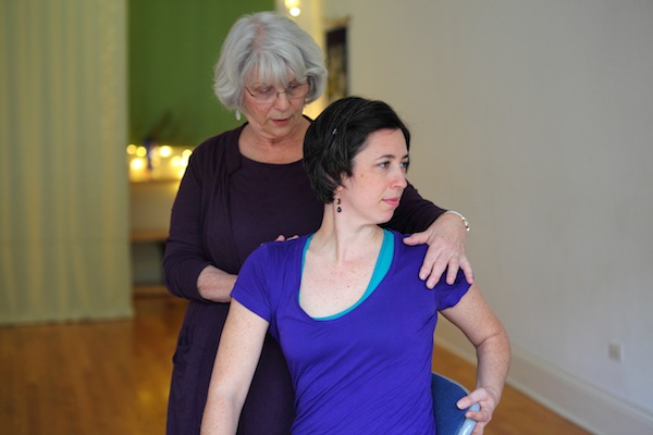 rhoda assisting seated twist